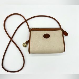 Vintage Dooney & Bourke, all weather leather, mini zip top crossbody.